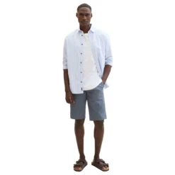 Tom Tailor Chino Baumwoll Bermuda Blue Structure Print -Modebekleidungs Geschäft tom tailor jeans slim printed chino shorts blau 34674 model vorne